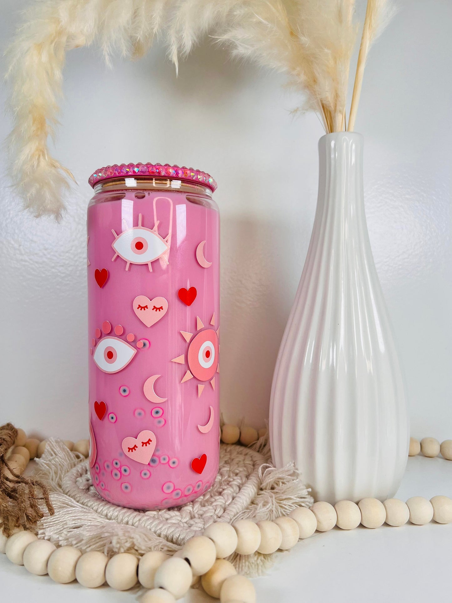 Lata de cristal con forma de bola de nieve con forma de ojo malvado rosa