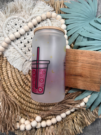 Lata de cristal rosa con forma de ojo malvado